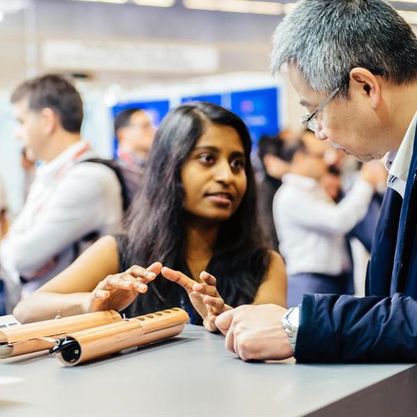 Delegates networking during conference