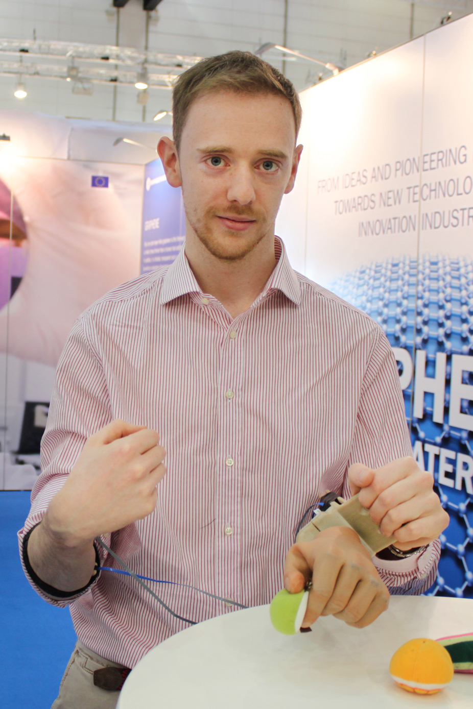 This robotic prosthetic hand is controlled by a wearable sensor in the form of a bracelet made by a cellulose and graphene composite