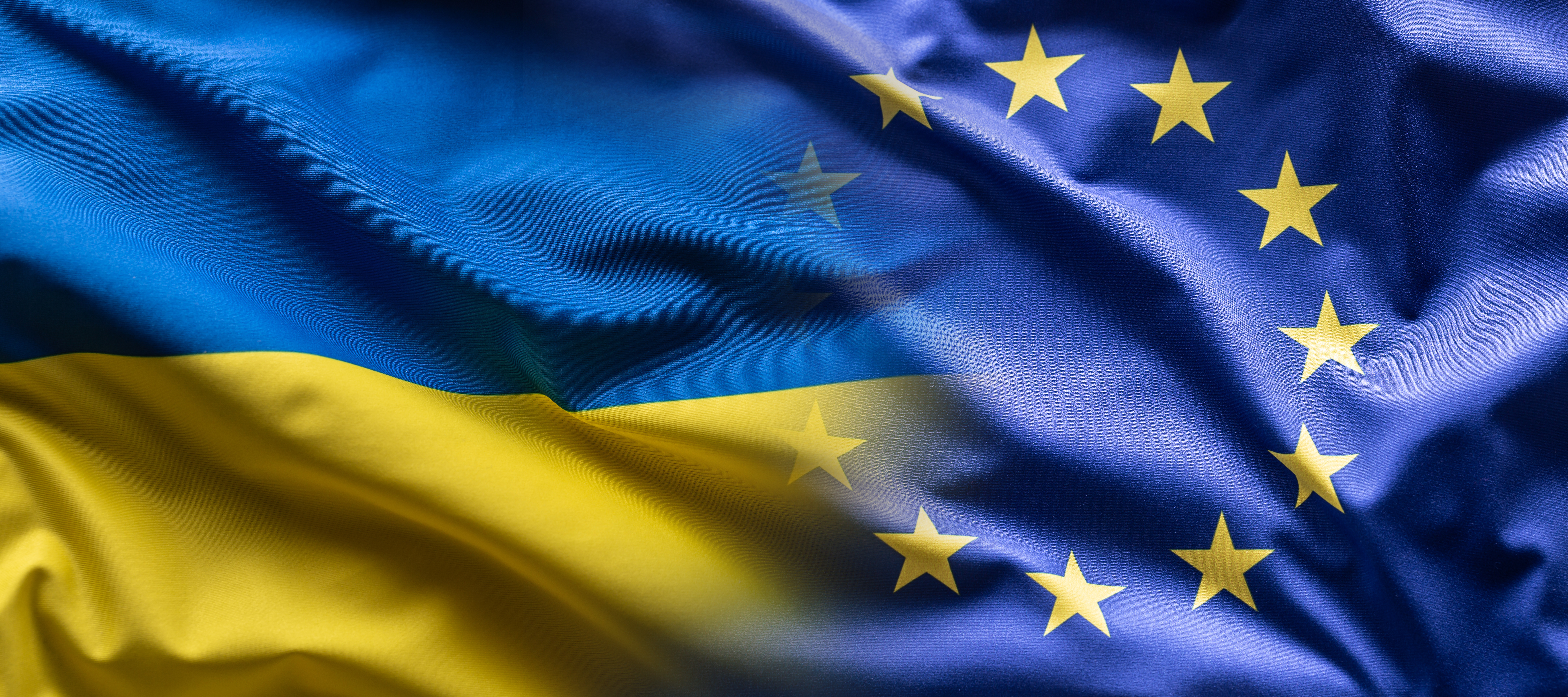 Ukrainian flag fading into EU flag